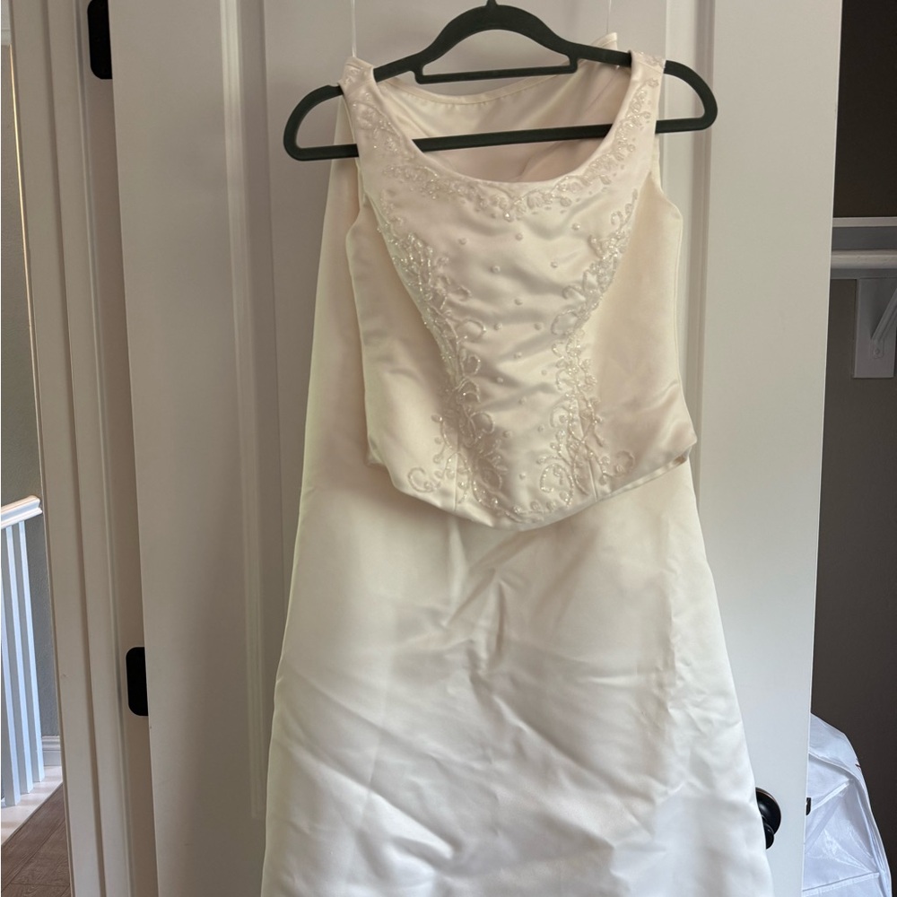 Two piece wedding dress with mermaid satin skirt and beaded top